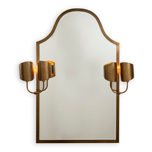Decorative wall mirror with gold sconces on a white background